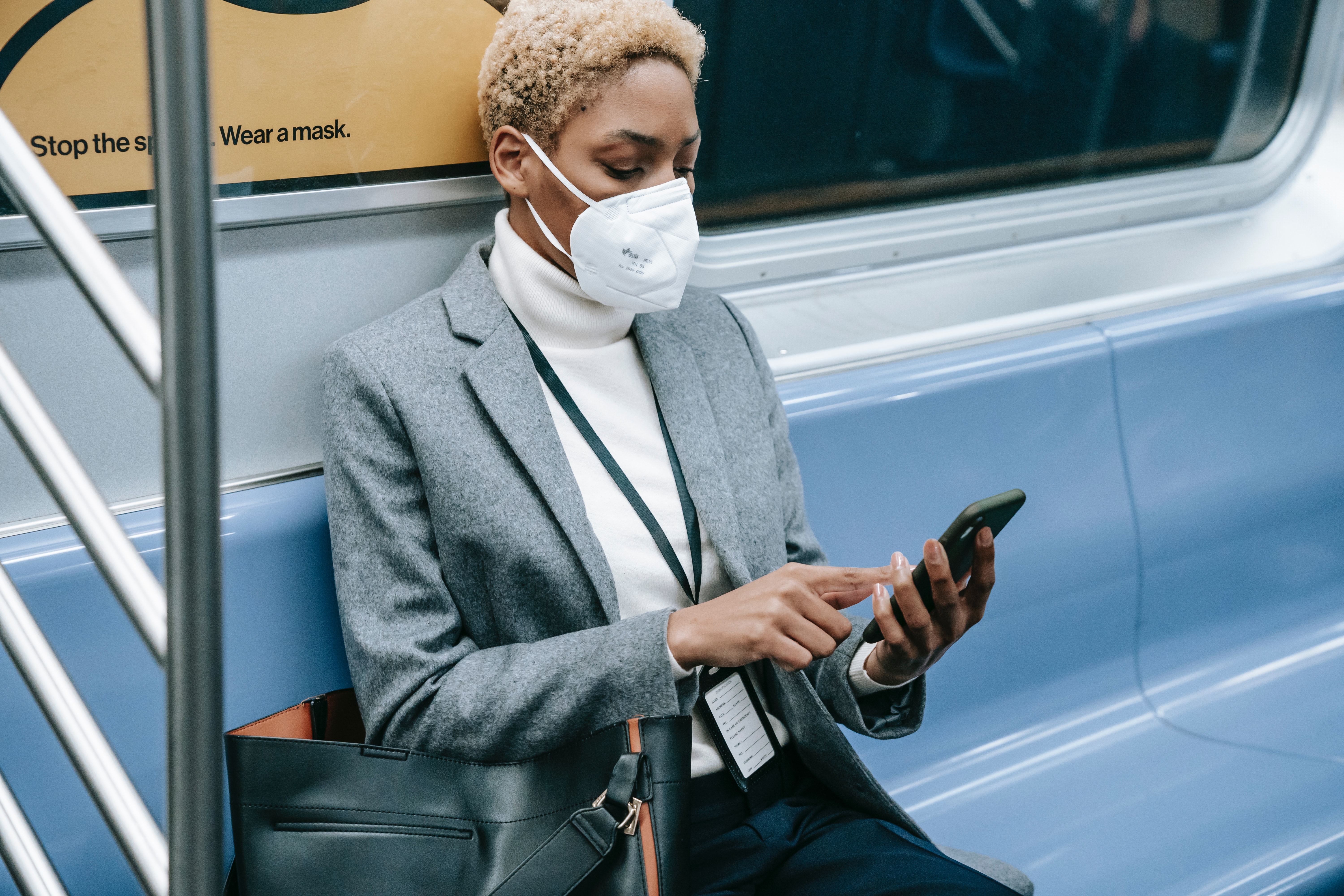 Woman in mask on subway
